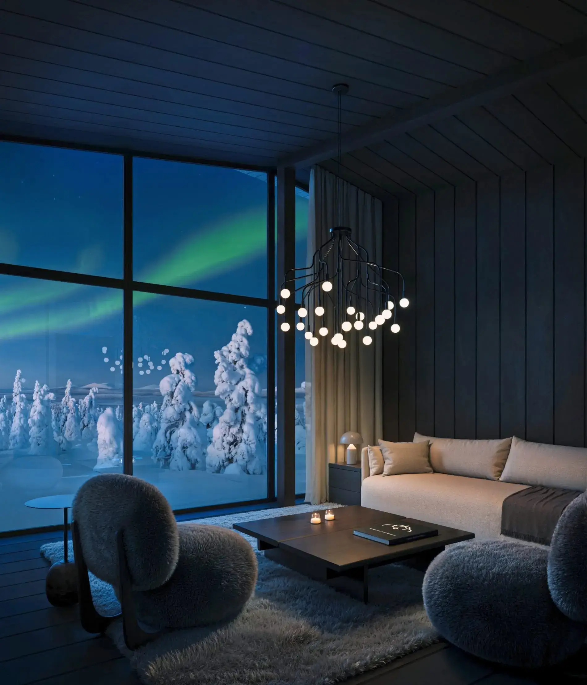 Die Innenräume der Deluxe Villen kombinieren warme Holzmaterialien mit modernen, nordischen Designelementen. Große Fenster sorgen für einen offenen Blick in die Umgebung.