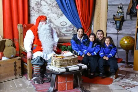 Family meets Father Christmas
