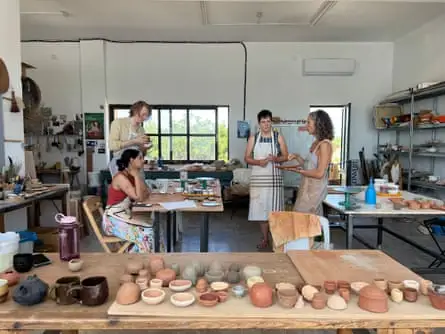 People working in a ceramics studio