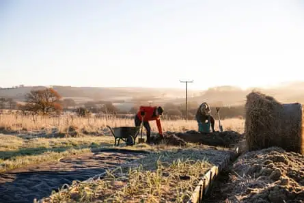 Female volunteers working in the countryside
