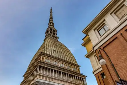 Spectacular old building with a spire and cupola