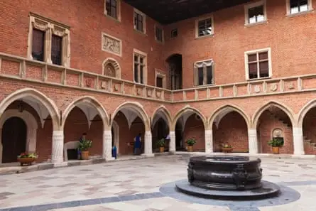 Beautiful old arched building around courtyard